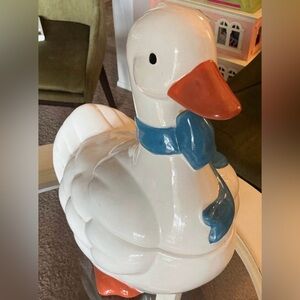 Vintage Goose/Duck Cookie Jar with a blue bow.